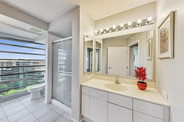 1720 Maple Ave Unit 1270, Evanston, IL 60201 - full bath featuring toilet, vanity, tile patterned floors, and a stall shower
