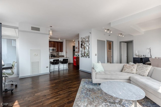 330 W Grand Ave Unit 2002, Chicago, IL 60654 - living room featuring track lighting, dark wood-type flooring, and baseboards