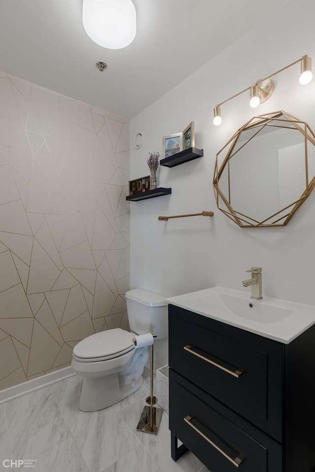 330 W Grand Ave Unit 2002, Chicago, IL 60654 - bathroom with vanity, toilet, and marble finish floors