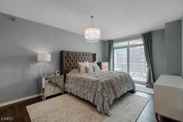 330 W Grand Ave Unit 2002, Chicago, IL 60654 - bedroom featuring access to outside, wood finished floors, a chandelier, and baseboards