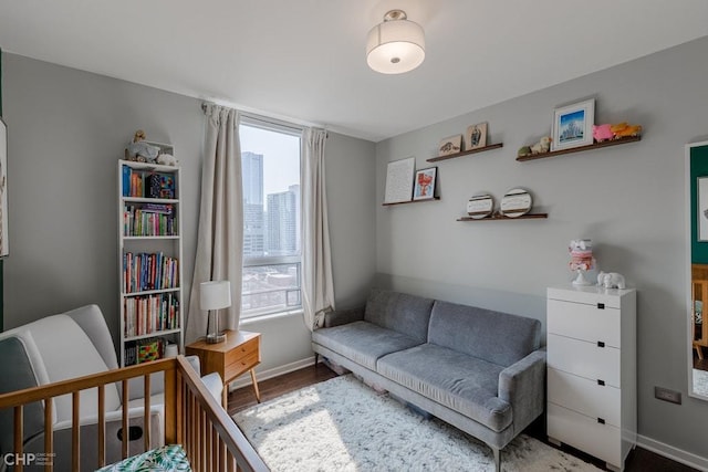 330 W Grand Ave Unit 2002, Chicago, IL 60654 - bedroom with multiple windows, baseboards, and wood finished floors