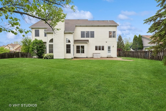17083 W Tiger Tail Ct, Gurnee, IL 60031 - back of property with a patio and roof with shingles