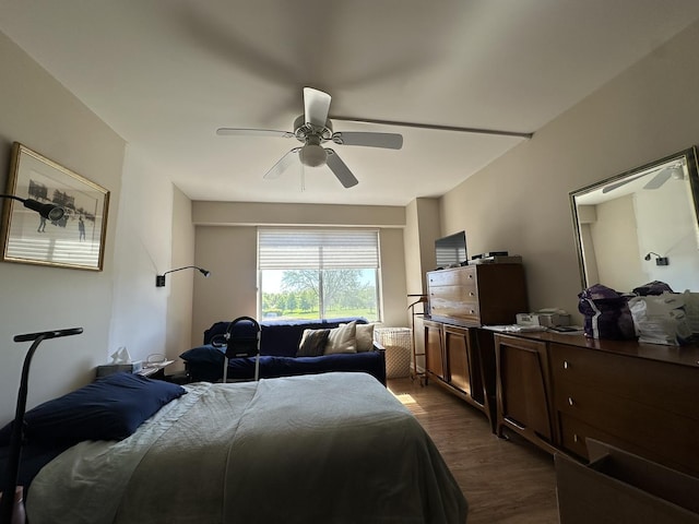7033 N Kedzie Ave Unit 301, Chicago, IL 60645 - bedroom with dark wood finished floors and ceiling fan