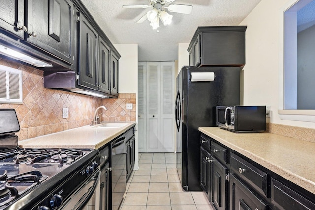 1116 S New Wilke Rd Unit 408, Arlington Heights, IL 60005 - kitchen featuring black appliances, a sink, dark cabinets, light countertops, and a textured ceiling