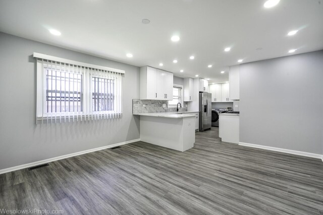 651 Clearmont Dr, Elk Grove Village, IL 60007 - kitchen with stainless steel refrigerator with ice dispenser, baseboards, dark wood finished floors, white cabinets, and recessed lighting