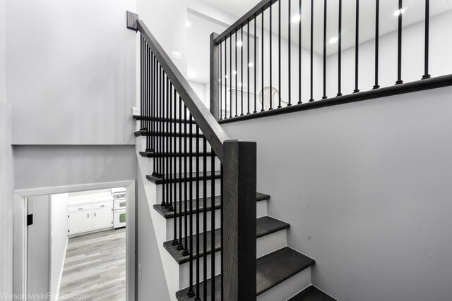 651 Clearmont Dr, Elk Grove Village, IL 60007 - stairway featuring wood finished floors