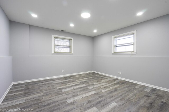651 Clearmont Dr, Elk Grove Village, IL 60007 - unfurnished room featuring plenty of natural light, wood finished floors, baseboards, and recessed lighting