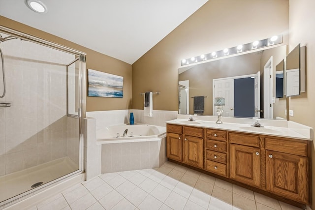 6173 Dixon Dr, Lisle, IL 60532 - full bathroom featuring lofted ceiling, a garden tub, double vanity, tile patterned flooring, and a stall shower