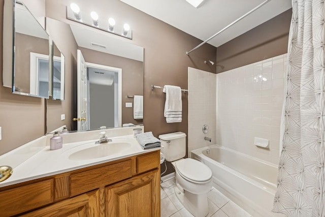 6173 Dixon Dr, Lisle, IL 60532 - full bathroom with toilet, shower / tub combo, tile patterned flooring, and vanity