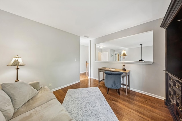 6173 Dixon Dr, Lisle, IL 60532 - living room featuring baseboards and wood finished floors