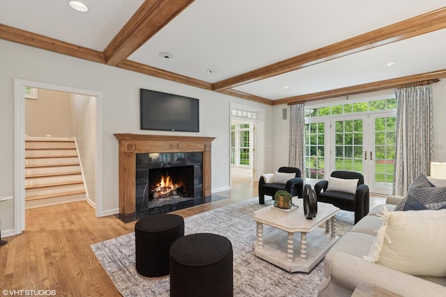 770 E Westminster Rd, Lake Forest, IL 60045 - living area featuring beam ceiling, a high end fireplace, stairway, light wood-type flooring, and ornamental molding