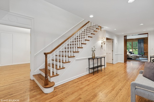 770 E Westminster Rd, Lake Forest, IL 60045 - stairs featuring wood finished floors, recessed lighting, and crown molding