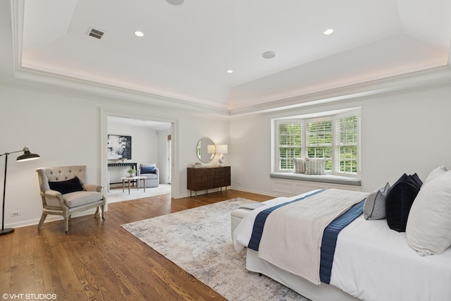 770 E Westminster Rd, Lake Forest, IL 60045 - bedroom with a tray ceiling, wood finished floors, and recessed lighting