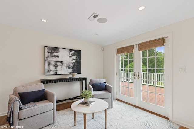 770 E Westminster Rd, Lake Forest, IL 60045 - sitting room with french doors, wood finished floors, and recessed lighting