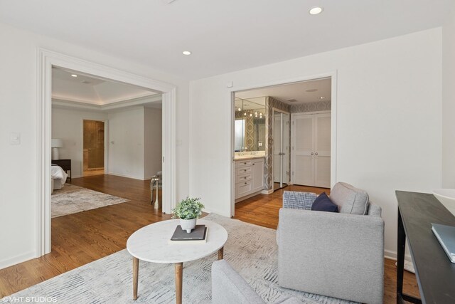 770 E Westminster Rd, Lake Forest, IL 60045 - living room featuring wood finished floors, recessed lighting, and a raised ceiling