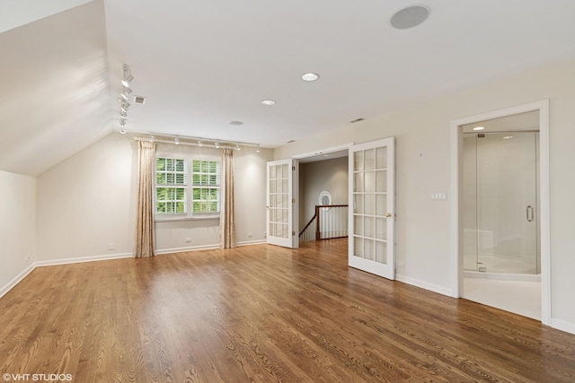 770 E Westminster Rd, Lake Forest, IL 60045 - spare room featuring french doors, rail lighting, wood finished floors, and recessed lighting