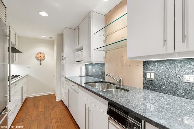 770 E Westminster Rd, Lake Forest, IL 60045 - kitchen featuring white appliances, wood finished floors, white cabinetry, dark stone counters, and backsplash