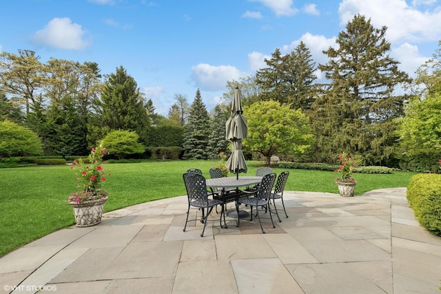 770 E Westminster Rd, Lake Forest, IL 60045 - view of patio / terrace featuring outdoor dining space and view of wooded area