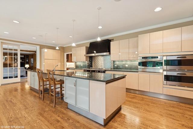 770 E Westminster Rd, Lake Forest, IL 60045 - kitchen with wall chimney exhaust hood, crown molding, double oven, modern cabinets, and tasteful backsplash