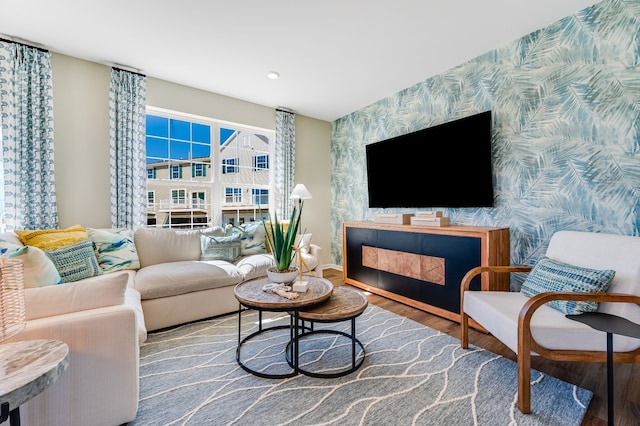 2262 Stonegate Rd, Algonquin, IL 60102 - living room featuring wallpapered walls, an accent wall, wood finished floors, and baseboards