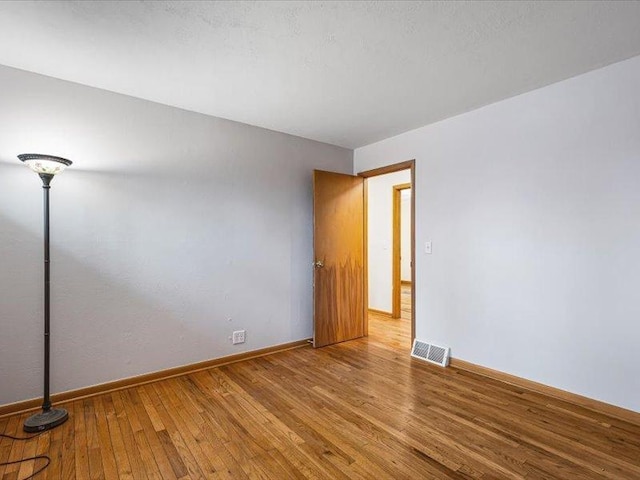 4560 Centerville Rd, Rockford, IL 61102 - empty room with hardwood / wood-style flooring and baseboards