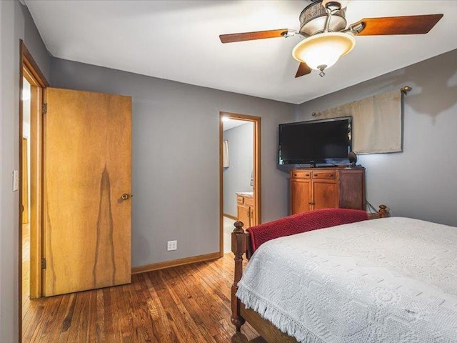 4560 Centerville Rd, Rockford, IL 61102 - bedroom with wood finished floors, baseboards, ensuite bathroom, and a ceiling fan
