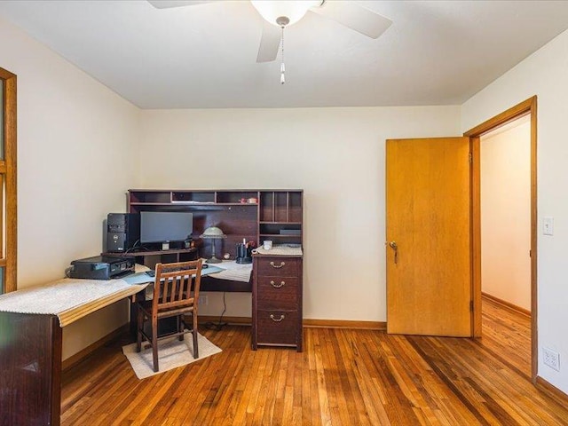 4560 Centerville Rd, Rockford, IL 61102 - office area with hardwood / wood-style floors, ceiling fan, and baseboards