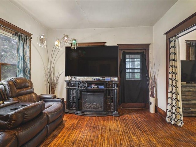 4560 Centerville Rd, Rockford, IL 61102 - living room featuring a fireplace and wood finished floors