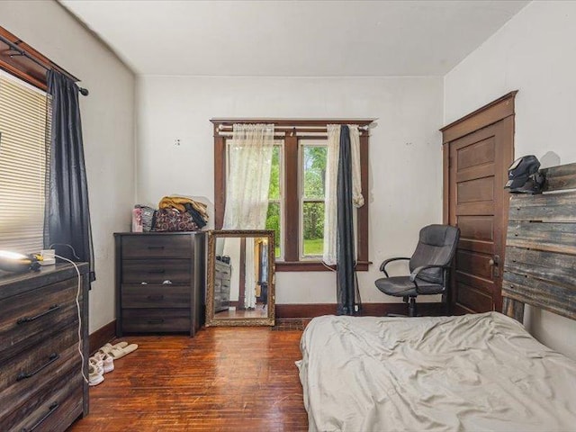 4560 Centerville Rd, Rockford, IL 61102 - bedroom featuring wood finished floors and baseboards