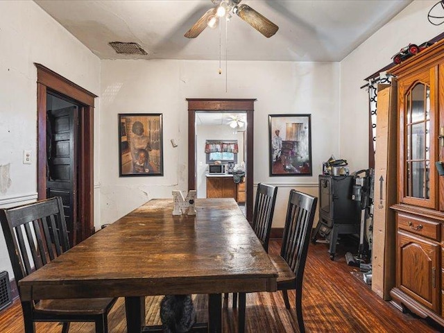 4560 Centerville Rd, Rockford, IL 61102 - dining space featuring a ceiling fan and dark wood-type flooring