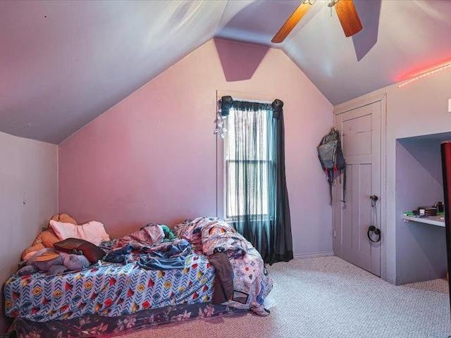 4560 Centerville Rd, Rockford, IL 61102 - bedroom with carpet flooring, vaulted ceiling, and ceiling fan