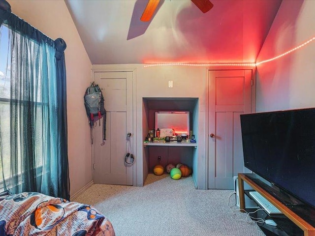 4560 Centerville Rd, Rockford, IL 61102 - bedroom with lofted ceiling, carpet, and a ceiling fan