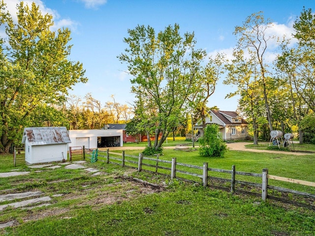 4560 Centerville Rd, Rockford, IL 61102 - view of yard featuring a detached garage and an outdoor structure