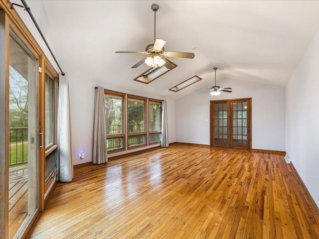 4560 Centerville Rd, Rockford, IL 61102 - unfurnished room featuring a ceiling fan, light wood-style flooring, and vaulted ceiling