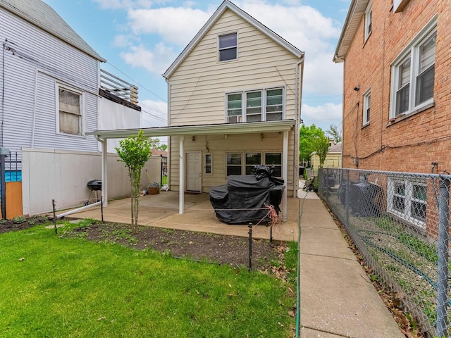 2531 N Lotus Ave, Chicago, IL 60639 - rear view of house with a patio