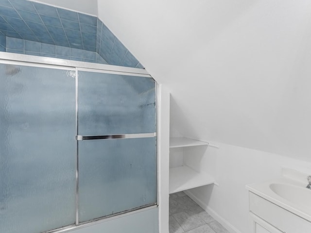 2531 N Lotus Ave, Chicago, IL 60639 - full bath with an enclosed shower, vanity, and lofted ceiling