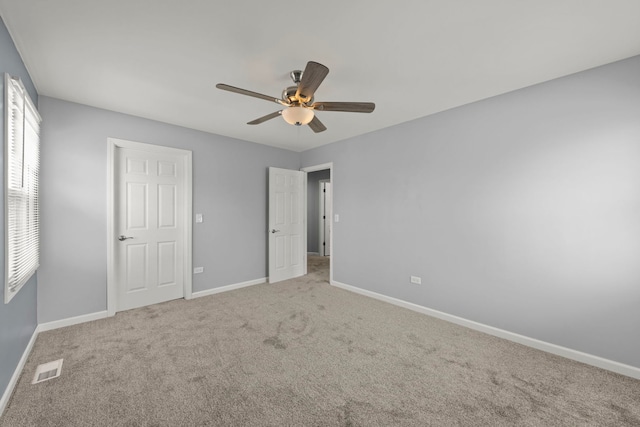 259 Nantucket Hbr Unit 259, Schaumburg, IL 60193 - unfurnished bedroom with baseboards, carpet floors, and a ceiling fan