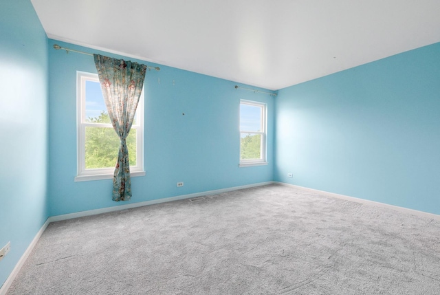 675 Fieldcrest Dr Unit 1A, South Elgin, IL 60177 - carpeted empty room featuring baseboards