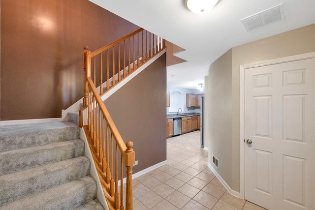 675 Fieldcrest Dr Unit 1A, South Elgin, IL 60177 - stairs with tile patterned flooring and baseboards