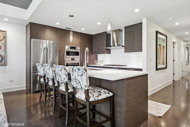 1018 N Larrabee St Unit 3S, Chicago, IL 60610 - kitchen featuring stainless steel appliances, wall chimney exhaust hood, modern cabinets, baseboards, and light countertops