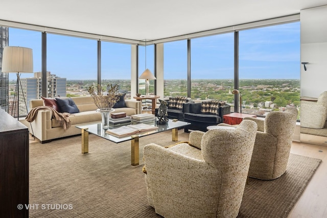 5445 N Sheridan Rd Unit 2715, Chicago, IL 60640 - living room featuring a wall of windows and wood finished floors