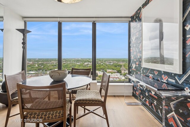 5445 N Sheridan Rd Unit 2715, Chicago, IL 60640 - sunroom / solarium featuring wood finished floors, floor to ceiling windows, and plenty of natural light