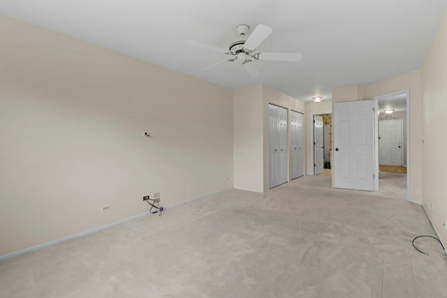 1406 Aldgate Ct Unit D2, Wheeling, IL 60090 - unfurnished bedroom featuring baseboards, light carpet, and ceiling fan
