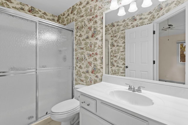 1406 Aldgate Ct Unit D2, Wheeling, IL 60090 - full bath featuring wallpapered walls, vanity, a stall shower, toilet, and a ceiling fan