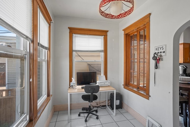 2403 Highland Ave, Berwyn, IL 60402 - tiled office space with plenty of natural light, arched walkways, and baseboards