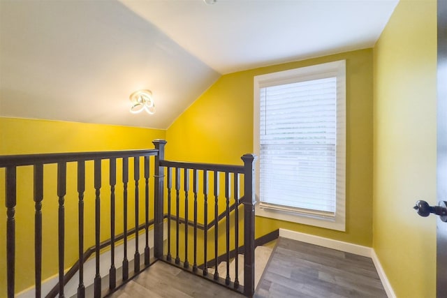 709 S Oak St, Bloomington, IL 61701 - stairs with vaulted ceiling, wood finished floors, and baseboards