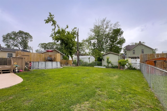 709 S Oak St, Bloomington, IL 61701 - view of yard with a deck