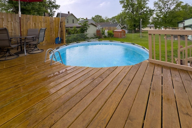 709 S Oak St, Bloomington, IL 61701 - view of swimming pool with a deck and outdoor dining space