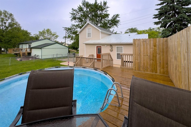 709 S Oak St, Bloomington, IL 61701 - view of swimming pool featuring a wooden deck