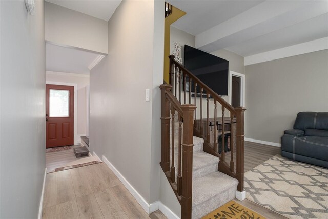 709 S Oak St, Bloomington, IL 61701 - foyer featuring wood finished floors, stairs, baseboards, and crown molding